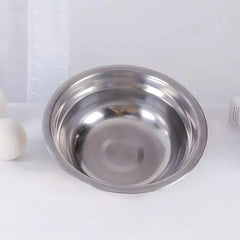 Elevated wooden pet bowl rack with 2 stainless steel bowls, tilted